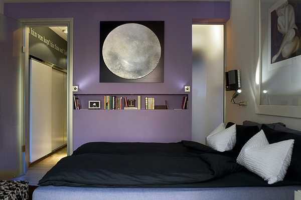 black and white bedroom decor and purple wall paint color