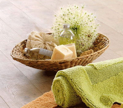 wicker basket green towels decor green colors