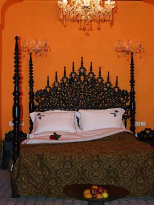 moroccan bed headbosts orange wall paint