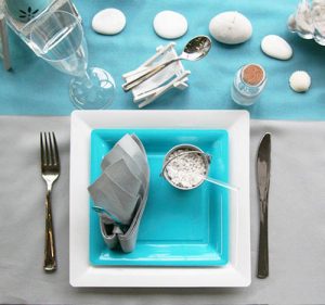 white and turquoise table cloth napkins and dinnerware for table setting