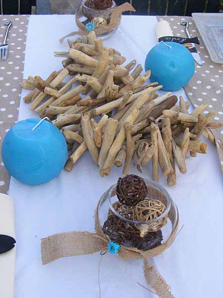 driftwood craft ideas with candles and wood sticks for table decoration