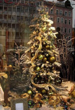 golden green christmas tree decorating