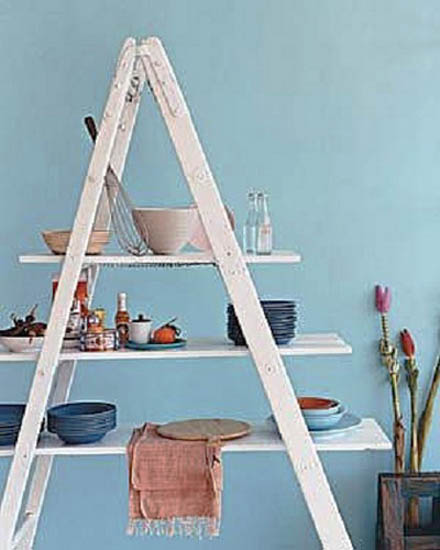 white ladder with selves for blue wall decoration