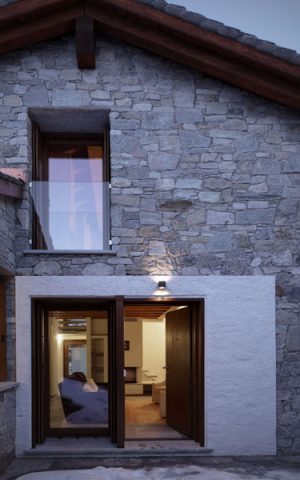 old house exterior and modern wooden doors