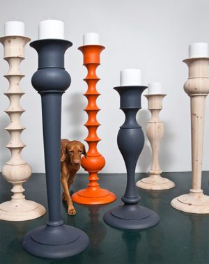 large candlesticks made of wood