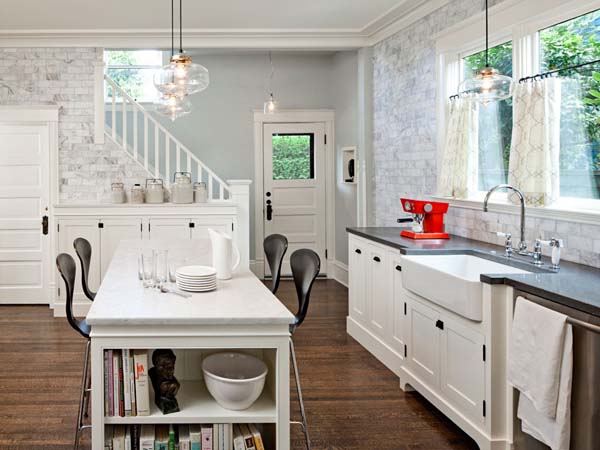 white kitchen cabinets and dining furniture