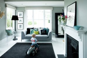 black floor carpet, mirror and picture frames