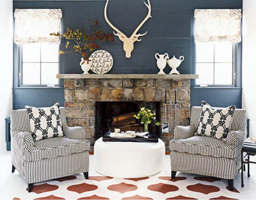natural stone fireplace and blue wall paint