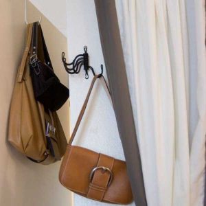 wall hooks and curtains for storing handbags