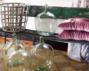 black painted bench and vintage glass jars
