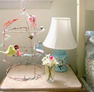 colorful bird decorations and table lamp