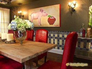 solid wood dining table with red leather chairs