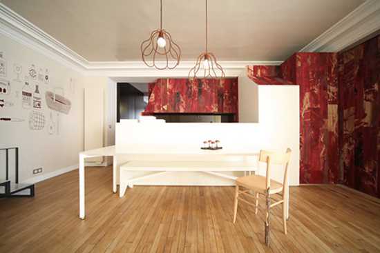 contemporary kitchen design with white cabinets and red wall panels