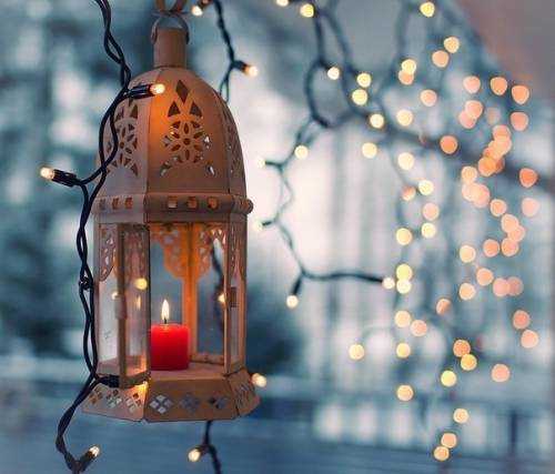 lantern with candles and christmas lights