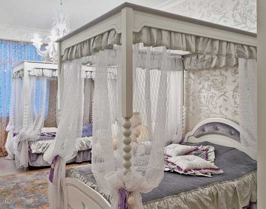 white bed with four posts in white color