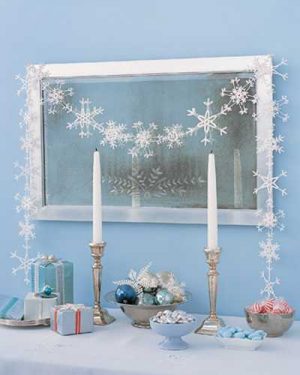 mirror decorated with snowflake garland