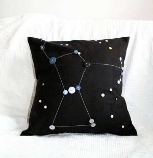 making pillows with fabric and buttons