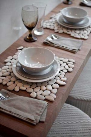 table placemats created with white pebbles