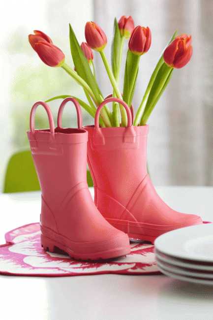 rain boots and flower arrangement for spring table decoration