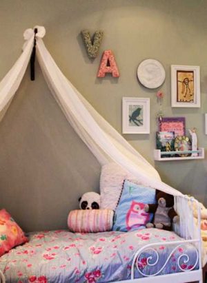 girls bed with fabric canopy