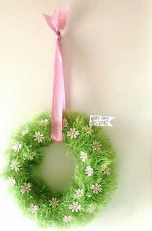 welcoming spring wreath with white flowers