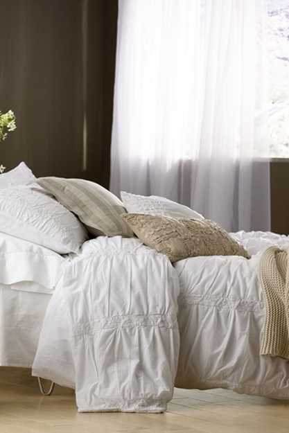 bedding set in light neutral colors