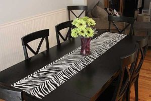 black dining table and black n white table runner