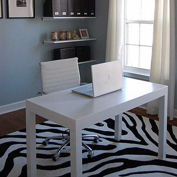 black and white room decorating with zebra floor rug