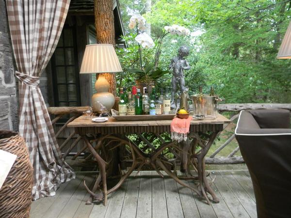 carved wood table for porch decorating