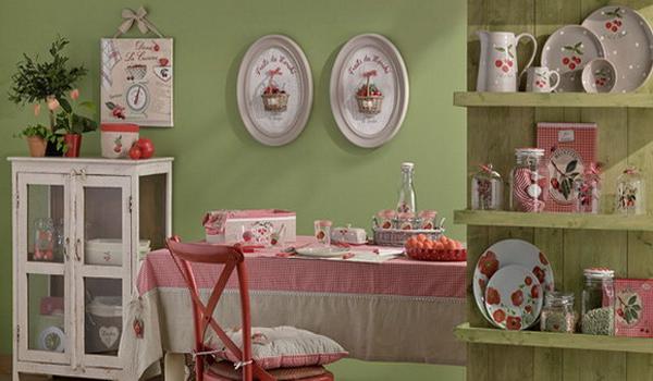 green wall paint and red home fabrics and furniture