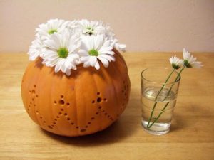 fall decorations, floral arrangements in handmade pumpkin pots and vases