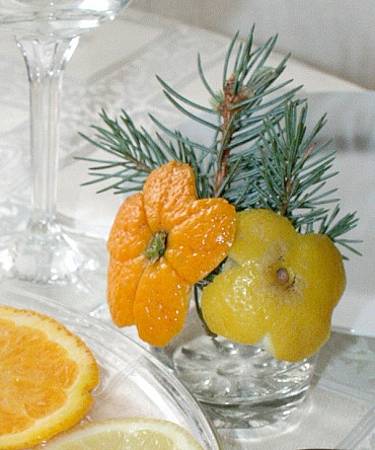 christmas decorations and table centerpieces with lemons