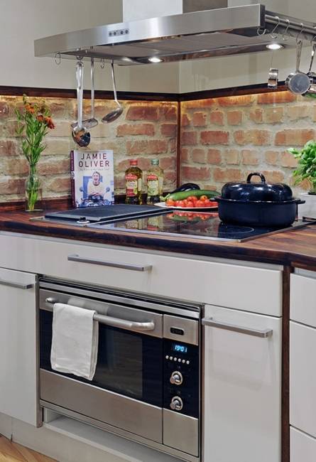 modern kitchen decor with brick accent wall