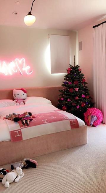 girls bedroom with pink christmas tree